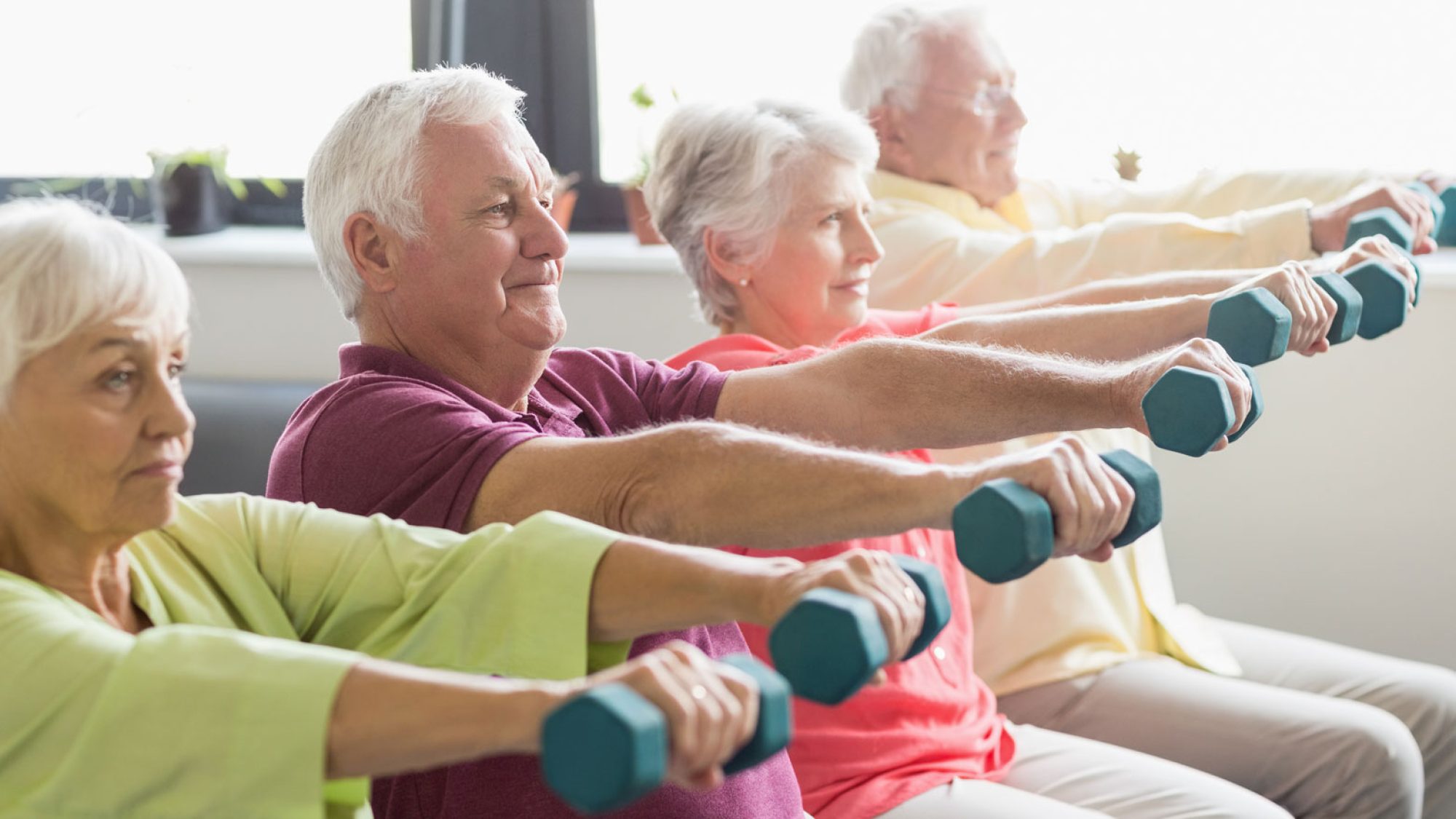 Older people exercising together