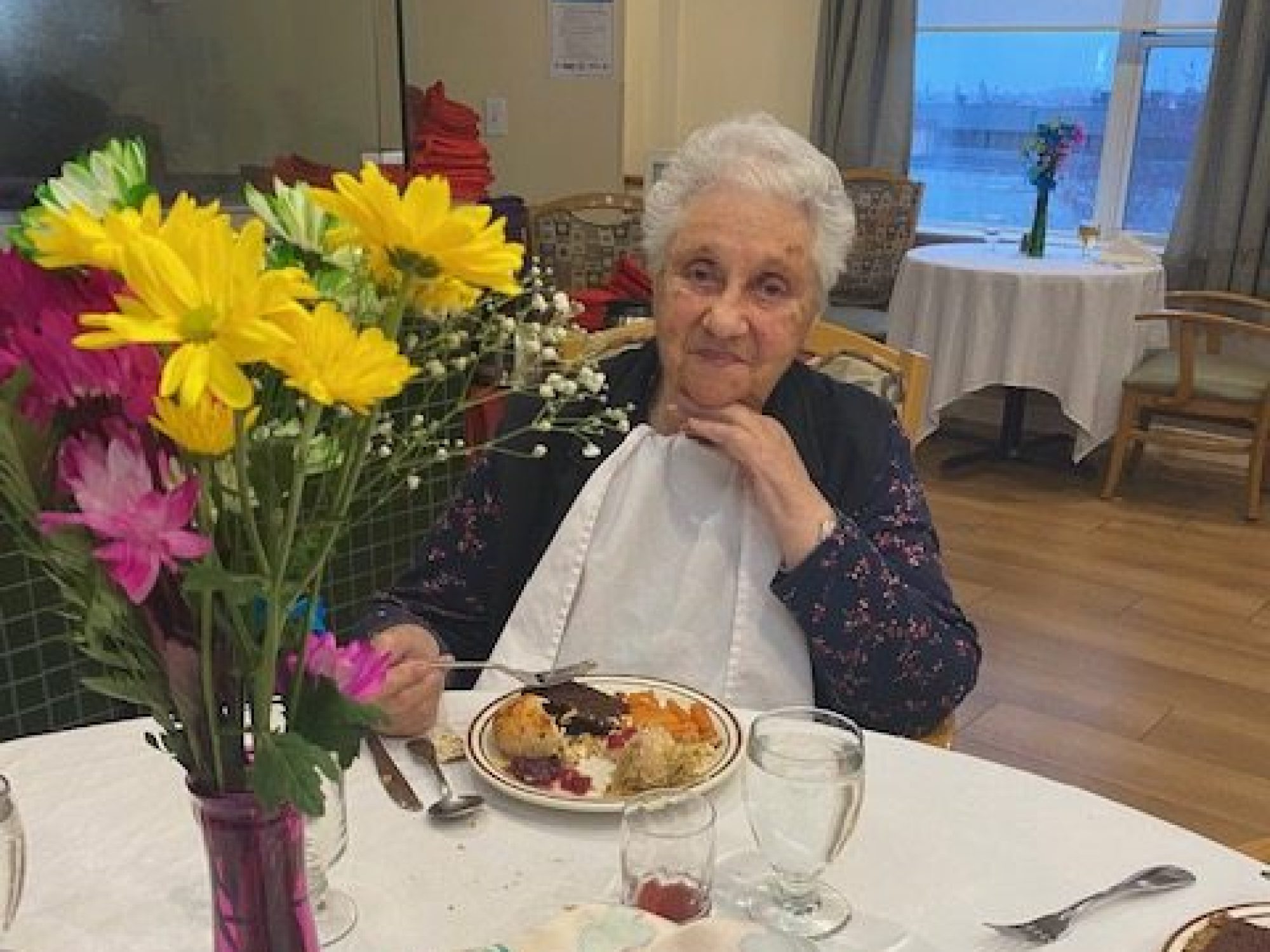A resident enjoys Passover Seder