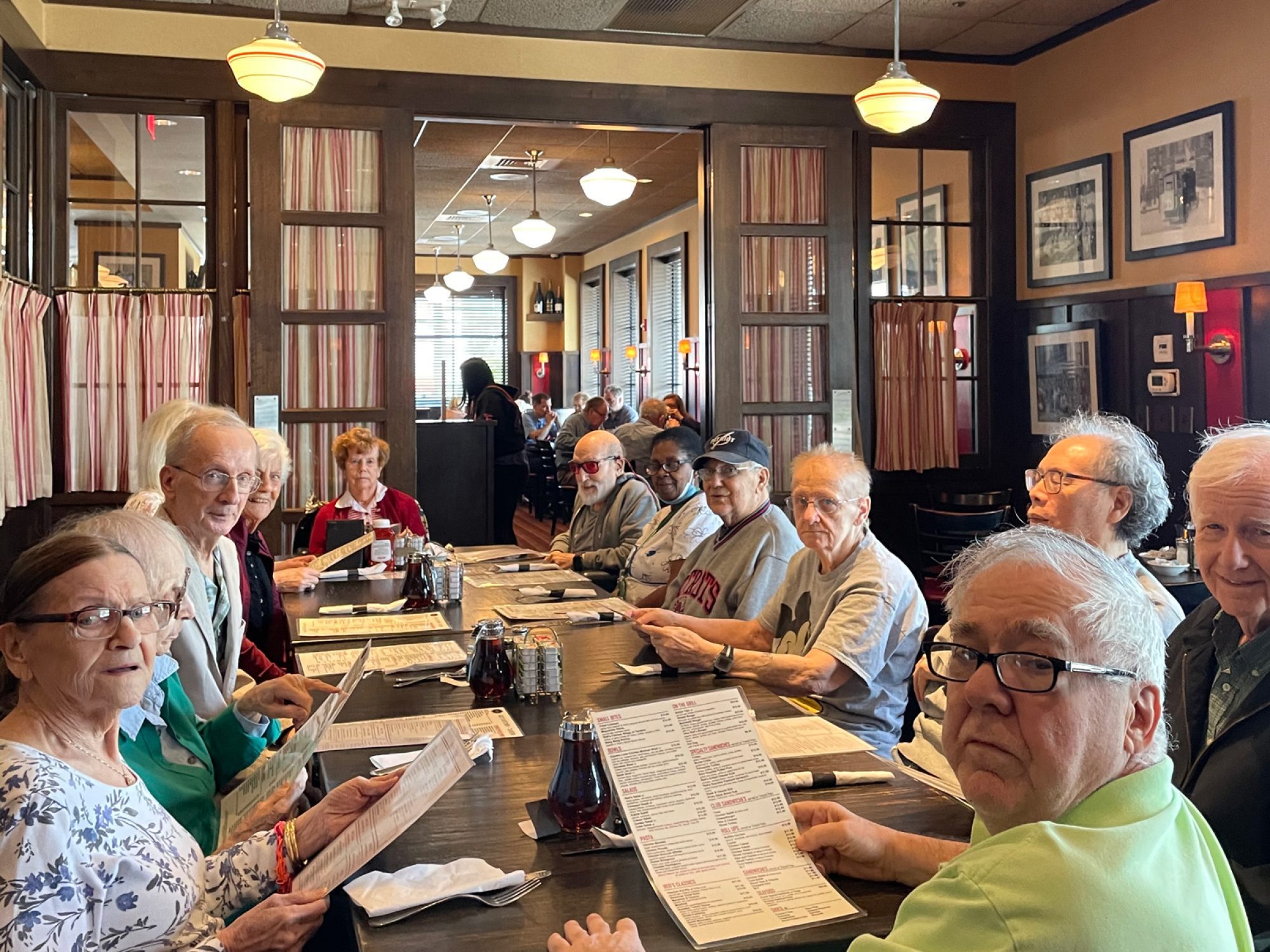 Peabody Campus Legacy residents enjoy a great lunch out at Reds restaurant. Pictured left to right are residents Marianne P, Barbara M, Bob S, Pat B, Howard R, Mickie G, Barb B, James S